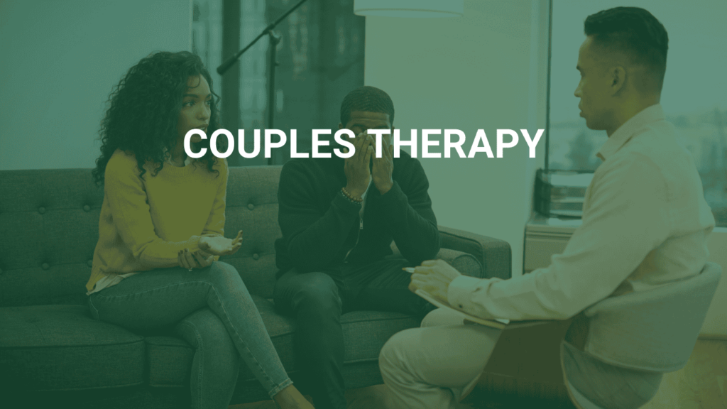 An Image of a couple sitting in a therapy/ counselling session